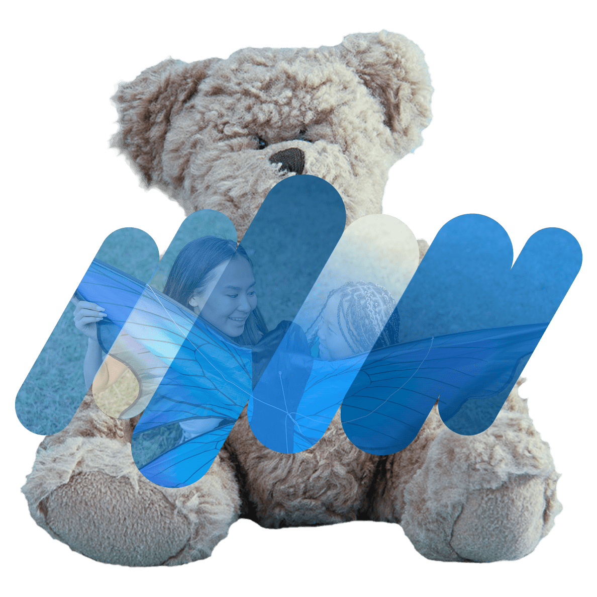 a light brown teddy bear sitting upright, there is a woman and a child holding a kite in an image in front of the bear